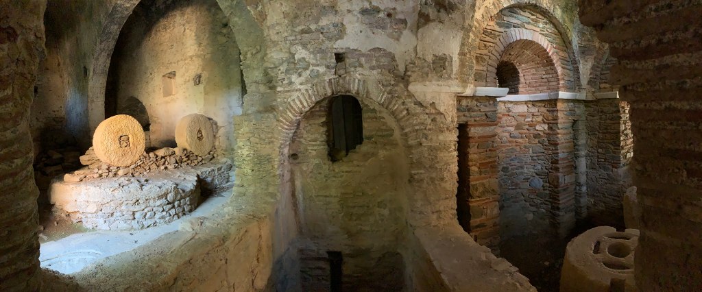 The bath house from the 11th century, altered into an oil press in later times