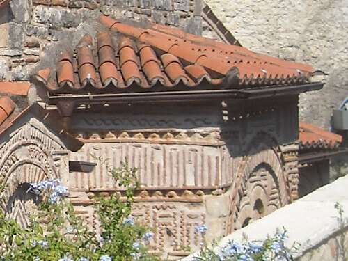The main church of Kato Panagia in Arta, Greece, showcases exquisite Byzantine brickwork.