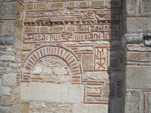 Inscription and monogram of Manuel II Doukas Komnenos in the south part of the main church of the Kato Panagia monastery in Arta, Greece