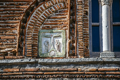 Byzantine glaze icon embedded in the wall of Saint Basil of the Market church, depicting the Crucifixion