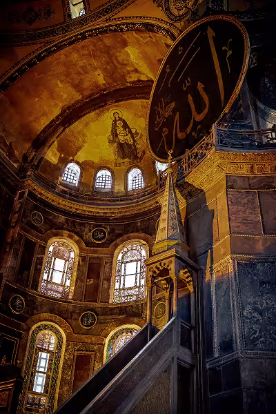 Ottoman decoration and calligraphic roundels, with the mosaic of the Virgin in the apse behind.