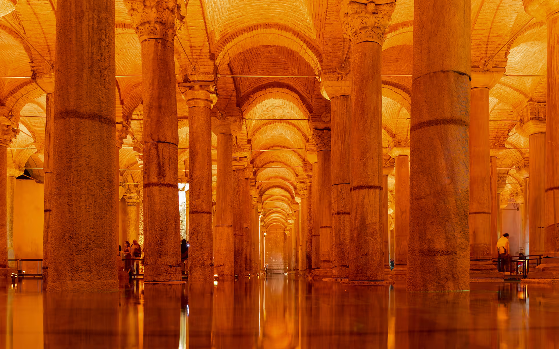 Interior of the Basilica Cistern in Istanbul, a 6th-century Byzantine underground reservoir with rows of illuminated columns reflected in water