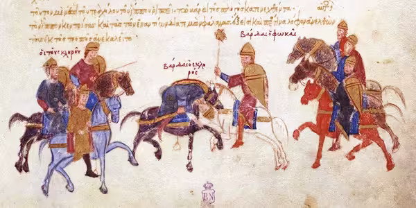 Medieval Byzantine miniature from the Madrid Skylitzes depicting the single combat between rebel generals Bardas Skleros and Bardas Phokas. At the center, Phokas on a white horse strikes Skleros with a mace, causing Skleros to lean heavily over his dark horse. Red Greek inscriptions above the riders identify them, flanked by supporting soldiers on horseback on both sides.